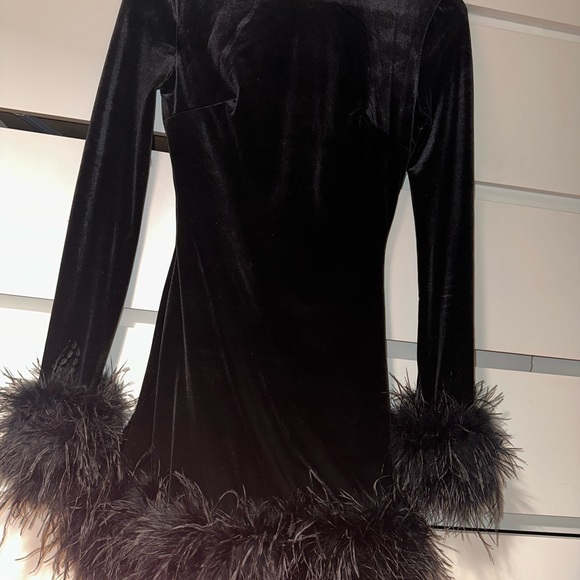 House of CB black velvet mini dress with feathers on cuffs and bottom - Picture 5 of 5